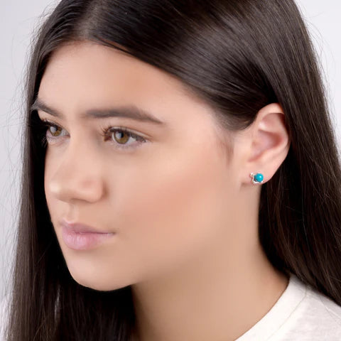 Henryka Snail in Shell Stud Earrings in Silver and Turquoise model shot