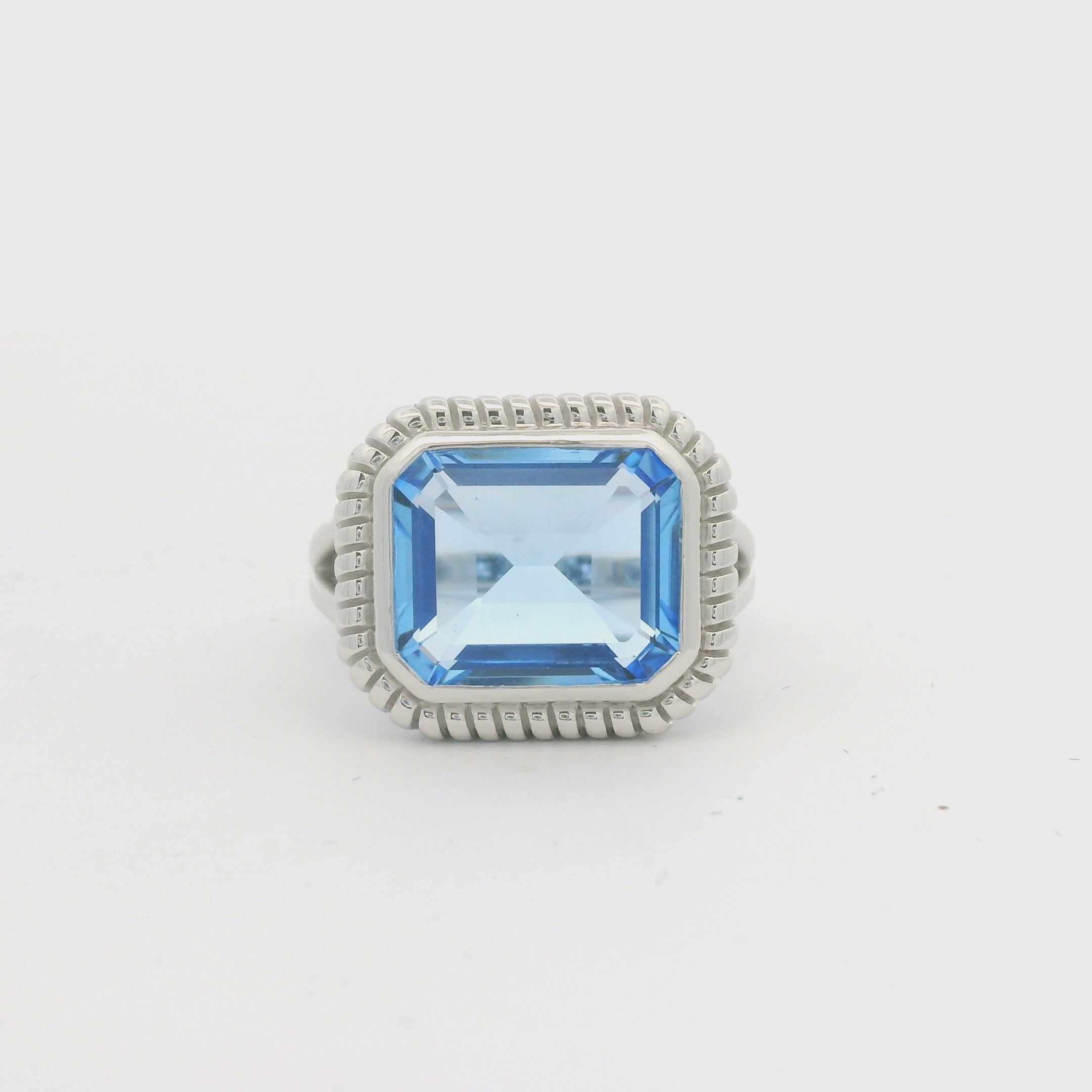 Silver Blue Synthetic Quartz Emerald Cut Ring