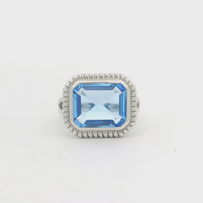 Silver Blue Synthetic Quartz Emerald Cut Ring