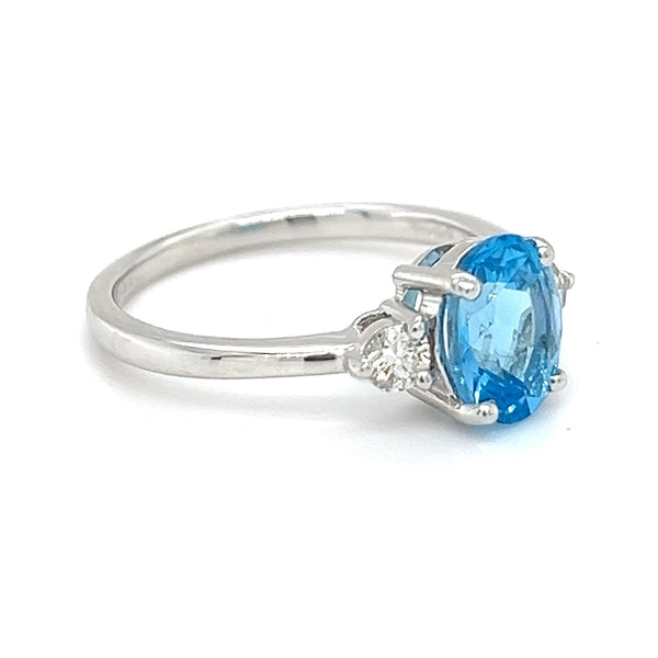 Blue Topaz & Diamond 3 Stone Ring 18ct White Gold side